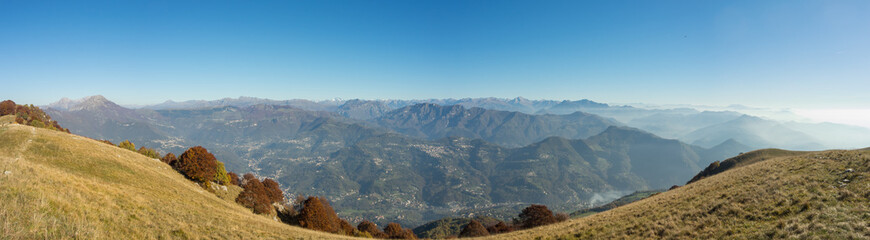 Great landscape on the Orobie Alps in fall time. Panorama from Linzone Mountain, Bergamo, Italy