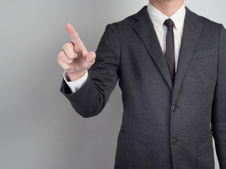 Businessman touching something .Idea business on white background.