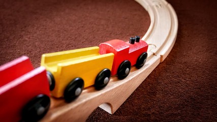 Wooden Train Toy Moving Down the Bridge