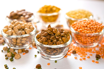 A close-up view of nutritious black chickpeas (Kala Chana) in a glass bowl, highlighting their rich earthy tone and textured surface. A protein-packed pulse commonly used in Indian and Middle Eastern