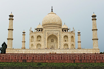 Taj Mahal white temple - Agra - with red brick wall around;