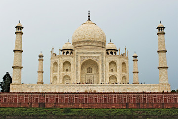 Taj Mahal white temple - Agra - with red brick wall around;