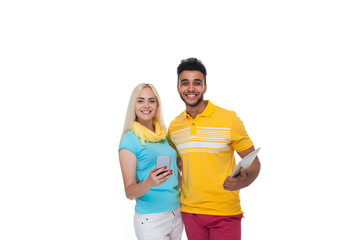 Beautiful Young Happy Couple Love Smiling Embracing Hold Tablet Computer Cell Smart Phone, Hispanic Man Woman Smile Isolated Over White Background