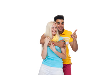 Beautiful Young Happy Couple Love Smiling Embracing, Hispanic Man Woman Point Finger To Empty Copy Space Isolated Over White Background