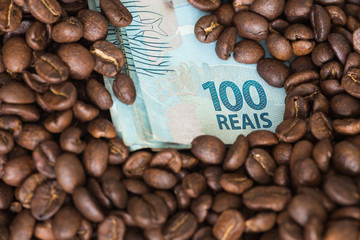coffee beans and Brazilian money / reais