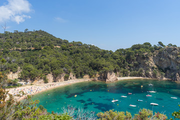 Coves of Cala Llorell beach in Tossa de Mar, Spain