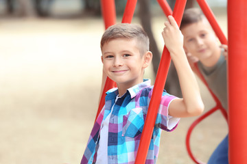 Cute boy on playground