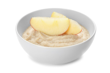 Bowl with porridge for baby on white background