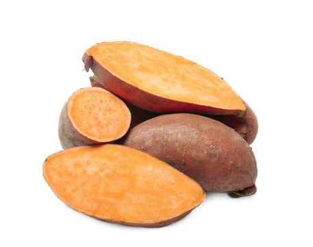Ripe sweet potatoes on white background