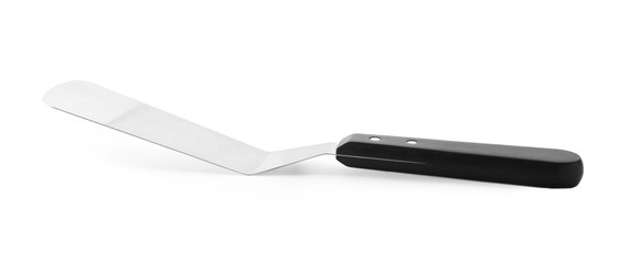 Spatula with black handle on white background