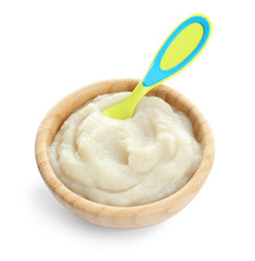 Bowl with baby food on white background