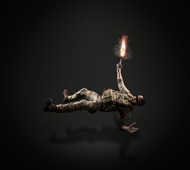USA Army soldier with fired gun (motion effect).  Shot in studio on black background. Action concept