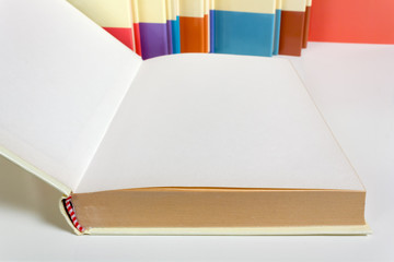 Open Book on a White Desk