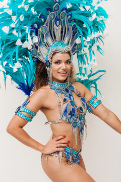 Beautiful brazilian samba dancer wearing blue traditional costume
