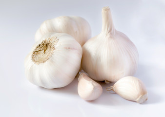 Garlic and Garlic Cloves and bulb on white background.