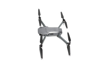 Flying helicopter drone with camera. Studio shot isolated on white background.