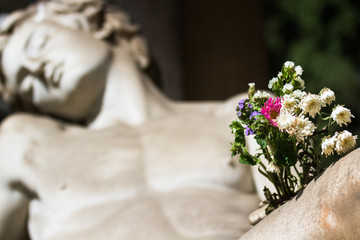Statue with flowers