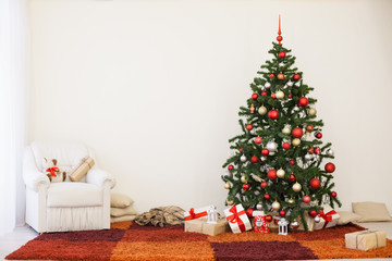 Christmas tree on new year's Eve in a white room with Christmas gifts