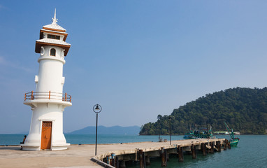 Fototapeta na wymiar Lighthouse on a Bang Bao pier on Koh Chang Island in Thailand