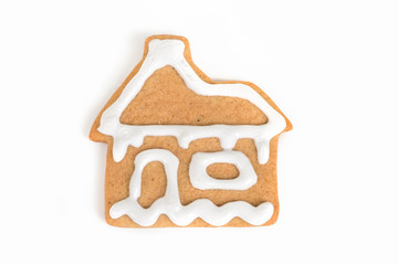 Christmas cookie with decoration /
Decorated cookie with house shape isolated on white
