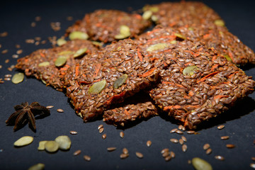vegan cereal crackers on a black background
