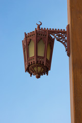 Fototapeta na wymiar Old arabic metal streetlight