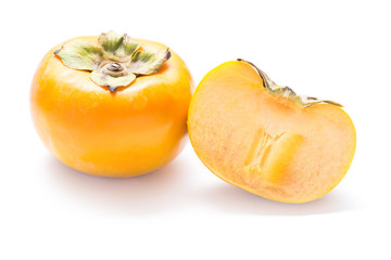 fresh persimmon fruit and piece on white background ( Diospyros virginiana L., EBENACEAE)