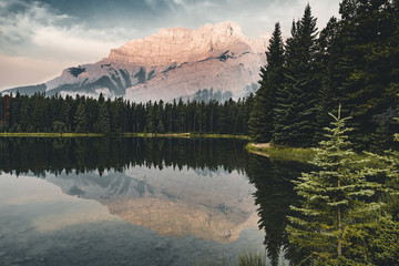 Two Jack Lake with mountain reflections along the Two Jack Lake 