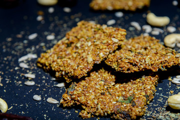 vegan cereal crackers on a black background