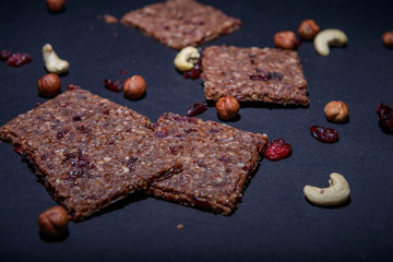 vegan cereal crackers on a black background