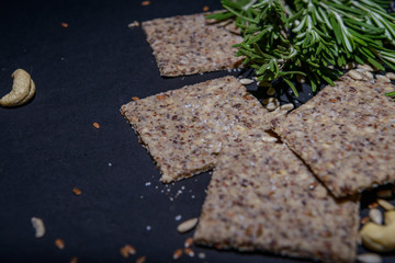 vegan cereal crackers on a black background