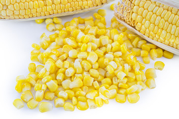 close up of sweet corn, ear of corn and canned corn isolated on white background, selective focus (detailed close-up shot)