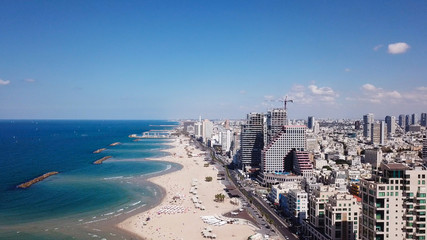 Tel Aviv coastline and skyline as seen from The Mediterranean sea. - obrazy, fototapety, plakaty