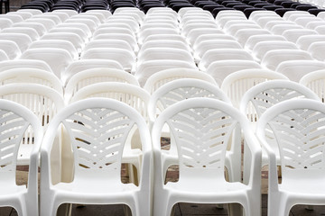Background of a set of plastic chairs 