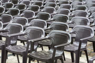 Background of a set of plastic chairs 