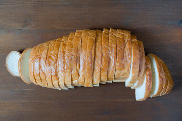 Sliced bread on table.