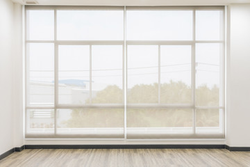 Roll Blinds on the windows, the sun does not penetrate the house. Window in the Interior Roller Blinds. Beautiful Blinds on the Window, the Sun and Heat Protection, the Perfect Windows Interior Decor