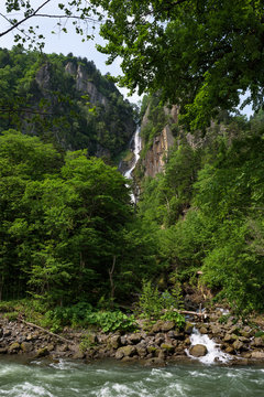 Waterfall dropping down into the Sounkyo gorge from the cliffs of Daisetsuzan National Park, Hokkaido, Japan