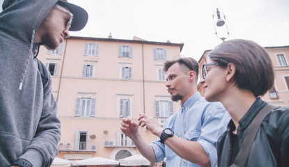 Friends talking in Rome