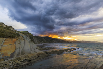 Itzurun beach is  known locally as the flysch at sunset near Zambia small town in Northern Spain