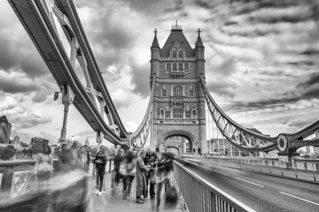 LONDON - SEPTEMBER 25, 2016: Beautiful view of Tower Bridge along Thames river. London attracts 30 million tourists annually