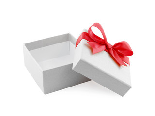 open empty grey gift box with red ribbon bow wrapped around lid isolated on white background, cardboard box wrapped with luxury gray paper and simple tied bow for surprise in holiday party event