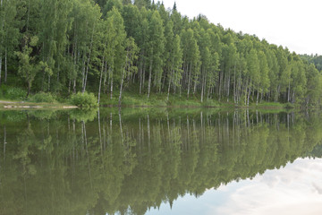 Fototapeta na wymiar lake of the woods in calm weather