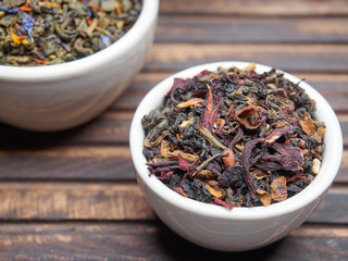 Tea of different kinds is poured into light cups.