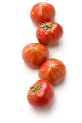 fresh japanese tomatoes isolated on white background