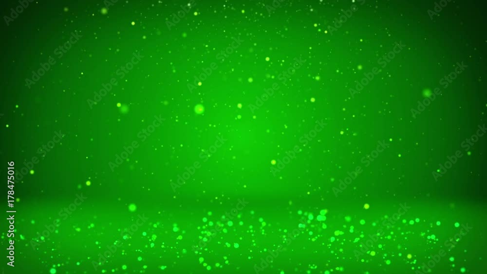 Poster shiny green particles or glitters fall and settle on the surface. background or place for your objec