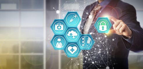 Faceless Manager Adding Padlock To Health Care IT