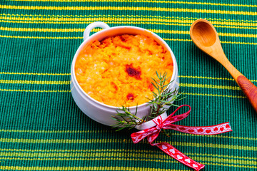 Carrot casserole Finnish traditional Christmas food. Vegetarian version made from carrots, coconut milk, syrup, cinnamon, carnation, oatmeal, oatmeal flour. Healthy food, clean eating, diet concept