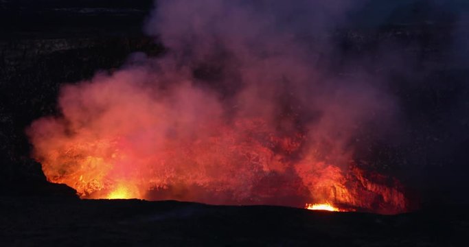 Violent lava eruption Kilauea Volcano crater Hawaii. Most active volcano in the USA. Smoke, steam, gasses. On the Big Island in Volcano National Park. Small eruptions and lava flow continually.