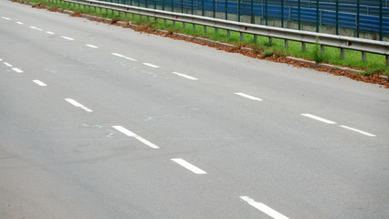 An asphalted city road with markings